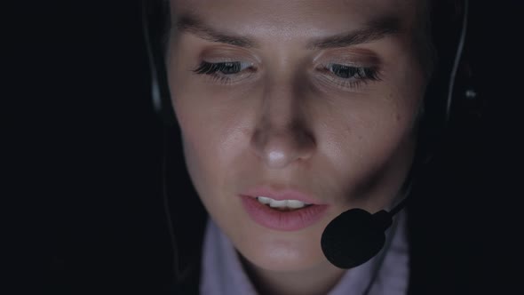 Woman Customer Service Representative Working at Night alt