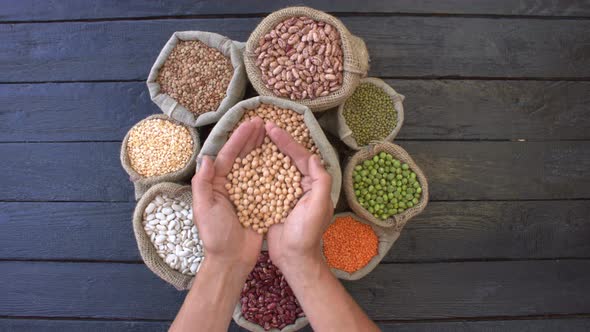 Legumes on Dark Wooden Ecological Background. alt