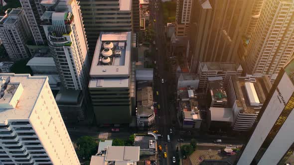 4k Aerial city view of Bangkok dowtnown, Flying over Bangkok, Thailand. alt