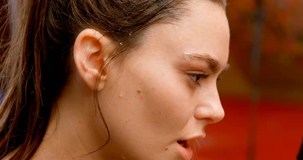 Woman standing in fitness studio 4k alt