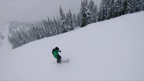 Outdoorsman Exploring Snowy Mountains Hiking Solo Social Distancing alt