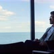 Young Businessman Looking Panorama Window - VideoHive Item for Sale