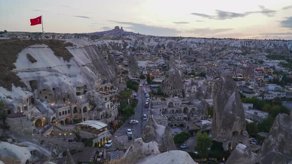 Day to night timelapse of a cityscape in Goreme, Cappadocia, Turkey alt