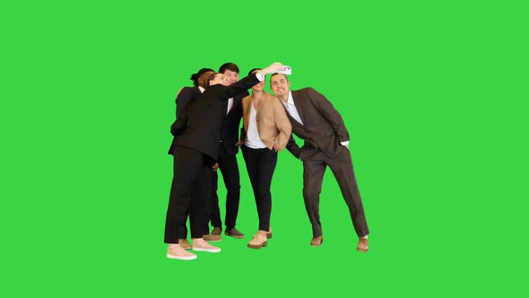 Group of Colleagues Making Selfies on a Green Screen Chroma Key