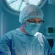 A Surgeon and His Two Assistants are Wearing - VideoHive Item for Sale