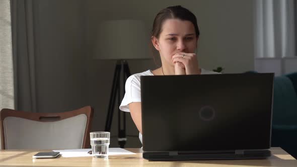 Authentic Caucasian Young Woman Chatting On Laptop At Home In Living Room