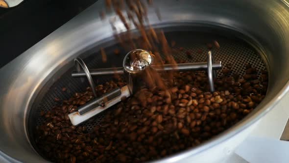 Mixing Roasted Coffee. Cooling Down Freshly Roasted Coffee Beans