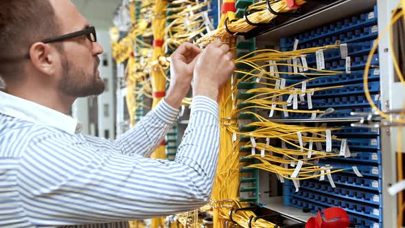 Engineer Working in Data Room alt