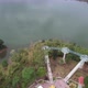 Aerial view by drone of the big buddha statue and skywalk by the Mekong river in Loei, Thailand - VideoHive Item for Sale