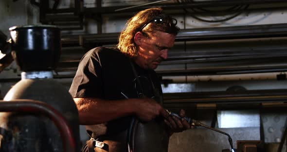 Welder using welding torch alt
