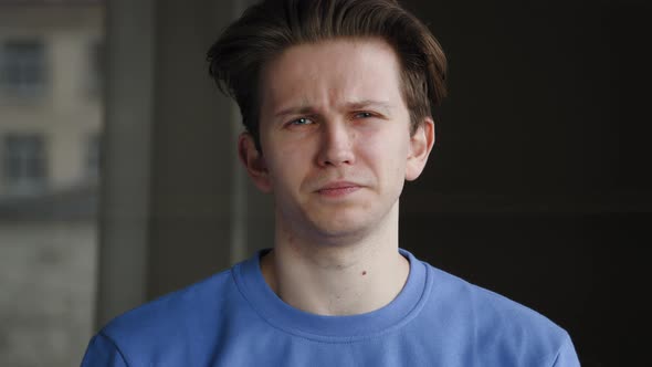 Closeup Headshot Male Portrait Indoors Caucasian Millennial Guy Young Student Man Looking at Camera alt
