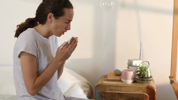 Happy mixed race couple enjoying the pool during a sunny day alt