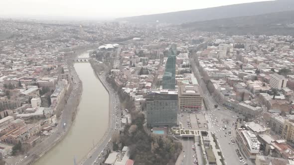 Flying over Shota Rustaveli Avenue. Skyscapers in the centre of Tbilisi alt