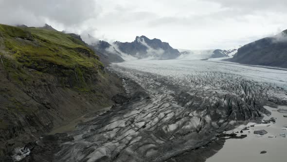Skaftafellsjokull Glacier Tongue With Mountain Views In Southeast Iceland. alt