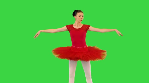 Young Ballerina in Classical Tutu Makes Some Ballet Movements on a Green Screen Chroma Key