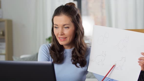 Teacher with Tutorial Having Online Class of Arts alt