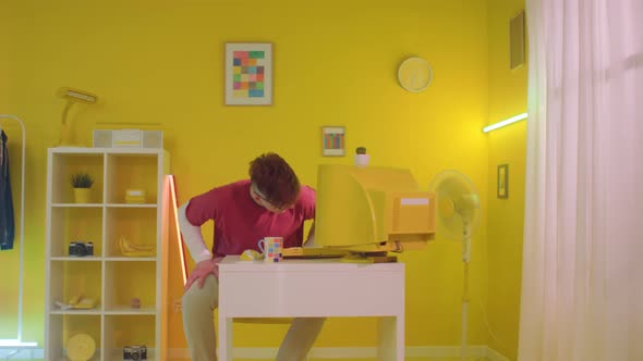 Young Man IT Professional In Yellow Office