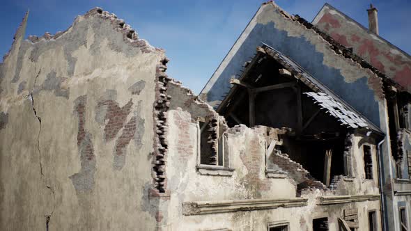 Destroyed Building and Pile of Debris After War