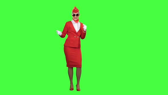 Girl in Sunglasses Is Dancing. Green Screen alt