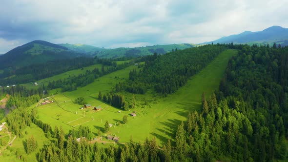 Bright Rolling Countryside Around a Farm in the Morning Light alt