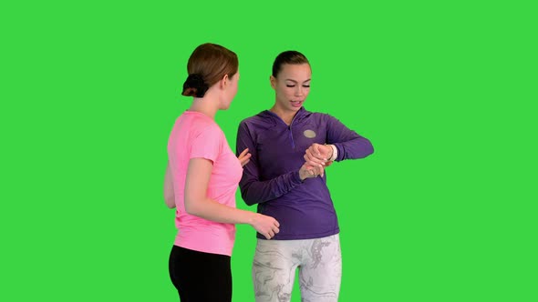 Two Young Women Talking and Running on a Green Screen Chroma Key alt