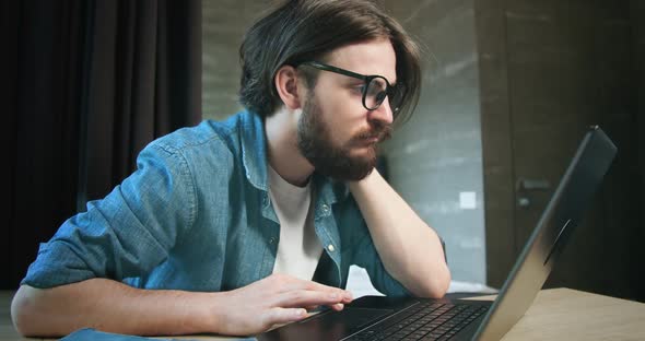 Male Student Browsing Internet