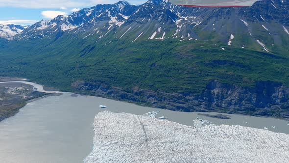 Flying over the Knick Glacier Terminus in the Lake Fork Knick River in a small airplane, east of Pal alt
