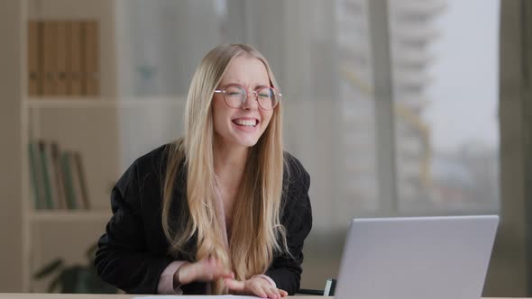 Successful Caucasian Millennial Business Woman Girl in Glasses Wins in Online Betting Receives alt