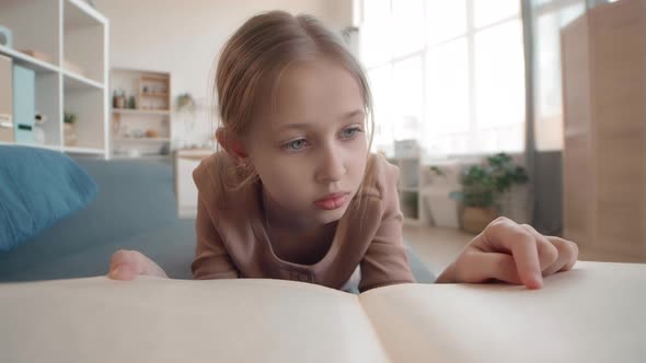 Cute Girl Reading Interesting Book alt