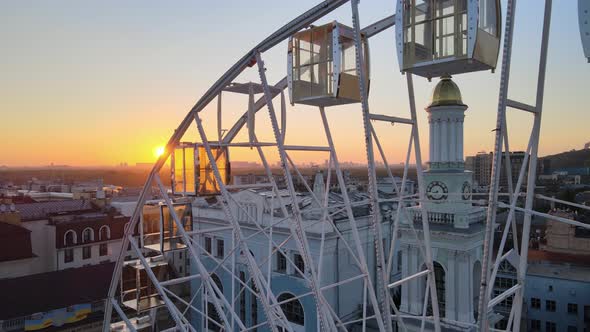 Ferris Wheel in the Morning at Sunrise in Kyiv, Ukraine. Aerial View alt