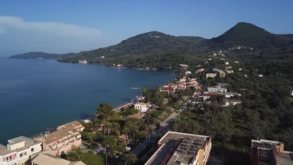 Greece, Corfu Island, drone footage of Messonghi Beach, Moraitika. Rise Shot. alt