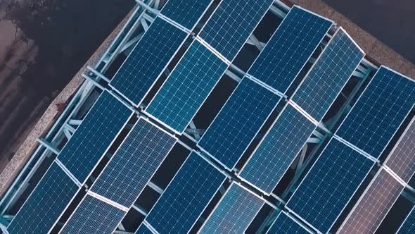 Top view of innovative solar panel collections on roof alt