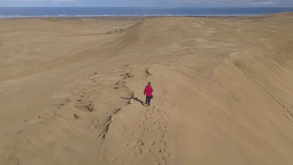 Walking on Giant sand dunes in New Zealand