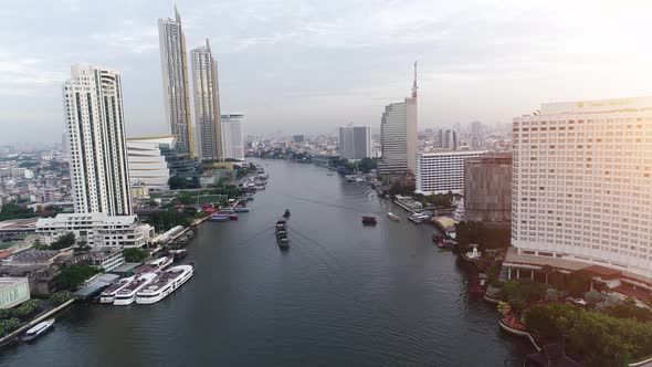 4k Aerial city view of Bangkok dowtnown, Flying over Bangkok, Thailand. alt