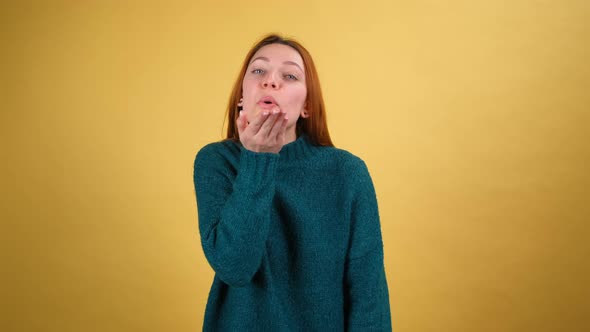 Young Red Hair Woman Posing Isolated on Yellow Color Background Studio alt