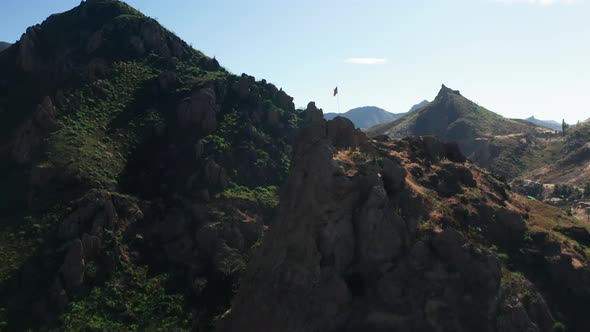 Nature of City of Malibu, California, USA, American Flag Waving in the Mountains alt