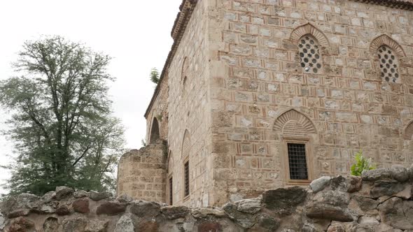 Mosque of Bali beg located in city of Nis fortress by the day 4K 2160p 30fps UltraHD tilting footage alt