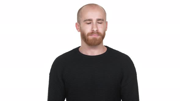 Horizontal Portrait of Determined Baldy Man 30s Shaking Head Denying Meaning Rejection Saying NO alt