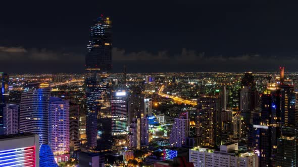 Bangkok business district city center above Silom area at night - Time Lapse