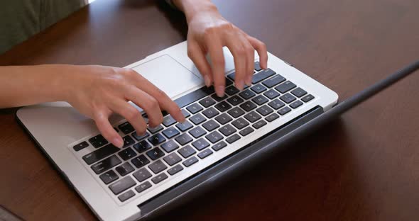 Woman type on computer