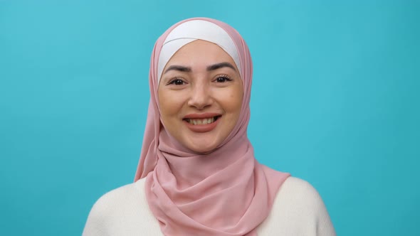 Young Muslim Woman in Hijab Smiling Happy Enjoying Successful