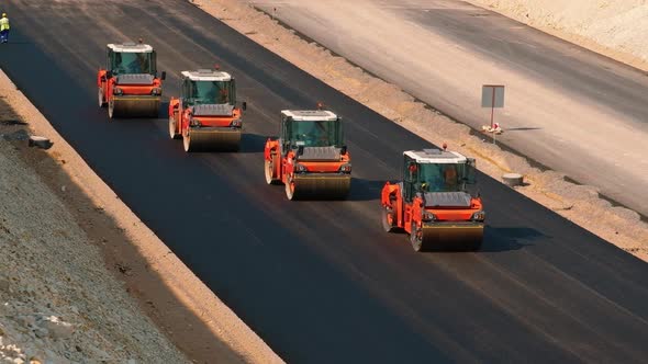 Road Rollers Compacts the Asphalt alt