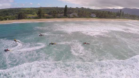 Aerial view of lifeguard surf rescue jet ski personal watercraft in Hawaii alt