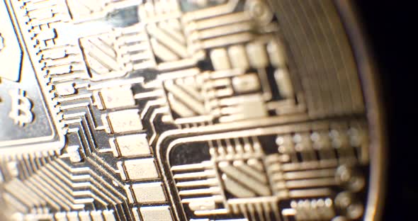 Close up on a cryptocurrency bitcoin with a mining emblem on the digital currency with encryption ci alt