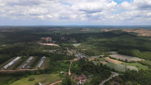 Aerial view of sky, village and cloudy sky in Malacca