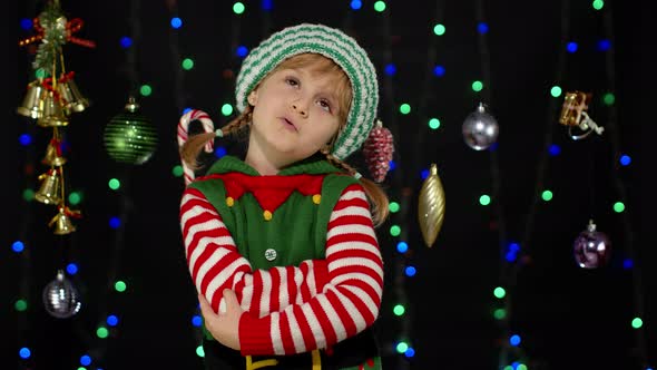 Displesed Kid Teenager Girl Elf Santa Helper Costume Negative Emotions Upset Christmas Eve alt