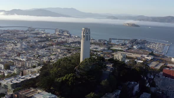 Aerial, San Francisco Coit Tower and cityscape, panning right drone 02. alt