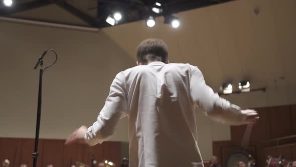 Conductor from behind