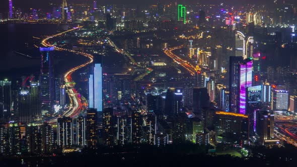 Shenzhen China Urban Cityscape Aerial Skyline Panorama Timelapse at Night Pan Up alt