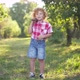 Wide Shot Portrait of Cute Redhead Curlyhaired Little Boy with Ukulele Posing in Sunny Summer Spring - VideoHive Item for Sale